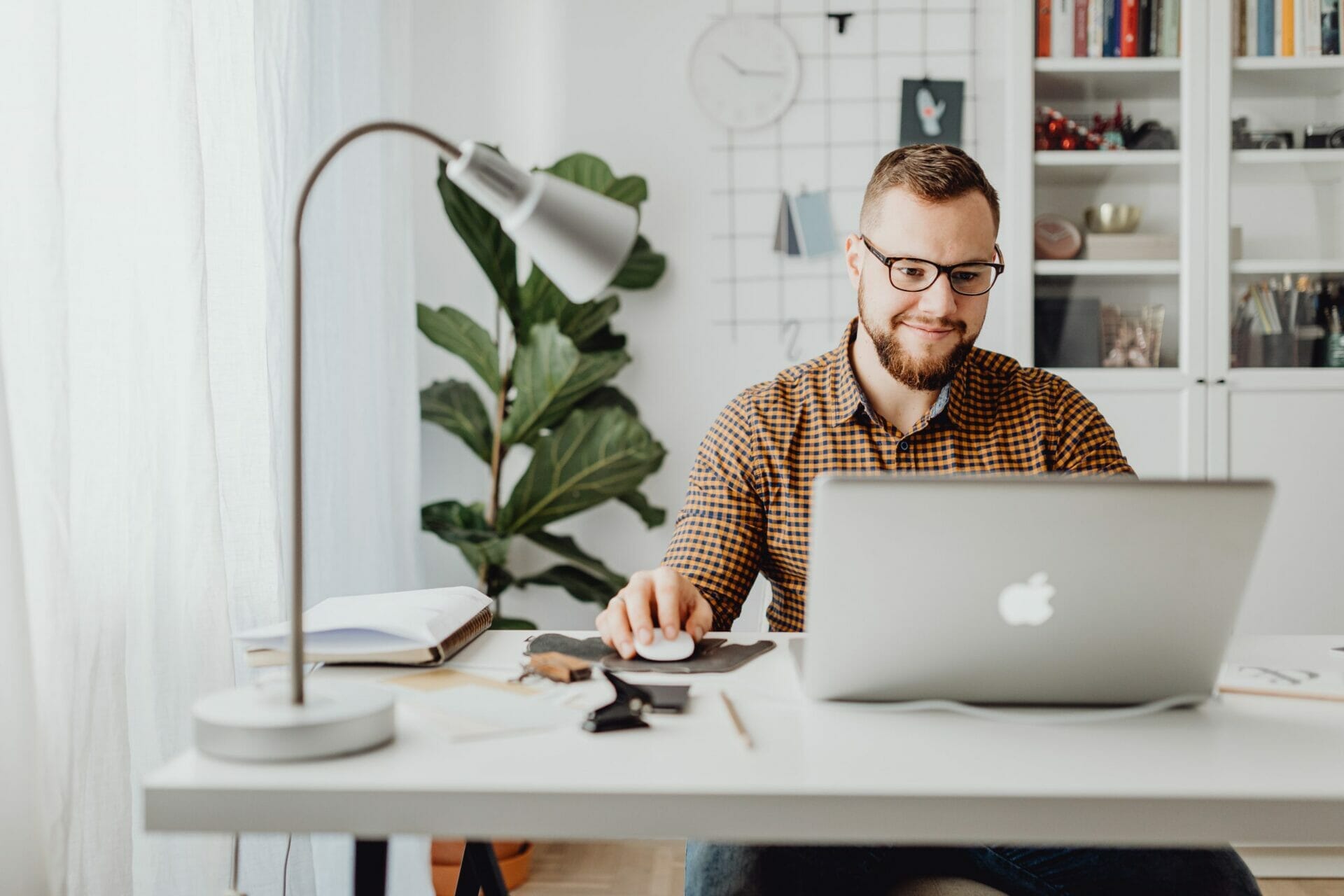 Man at computer using Jim2 Saas Software