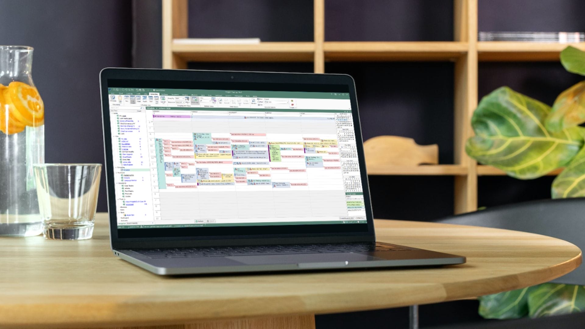 Jim2 Scheduling laptop screen on desk ERP
